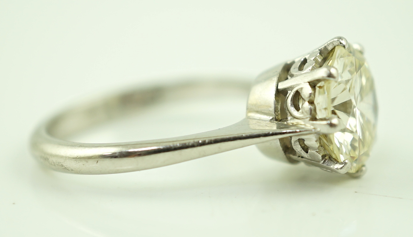 A platinum and solitaire diamond set ring